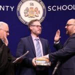 karl frisch takes oath of office