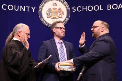 karl frisch takes oath of office